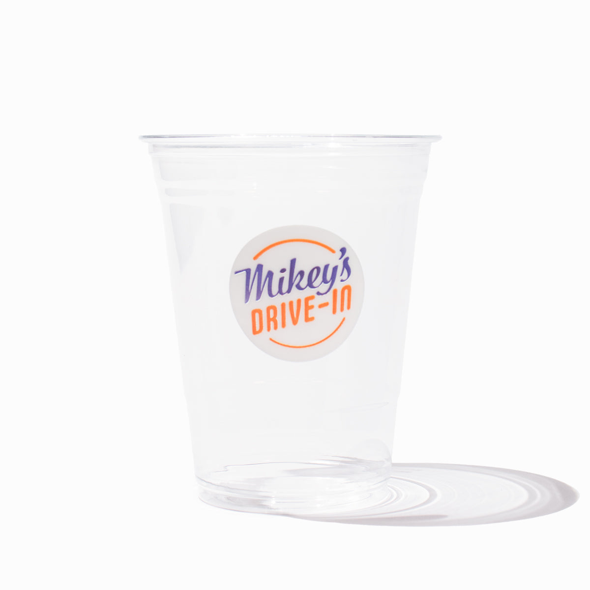 Custom printed clear PET cups with a brand logo for cold drinks