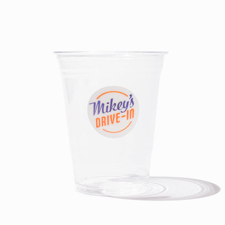 Custom printed clear PET cups with a brand logo for cold drinks