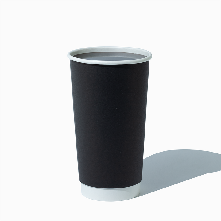 20 oz double wall black hot paper cup in use