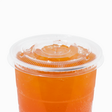 Clear 107mm flat lid on a 32 oz cold drink cup